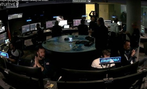 Scorpius Space Launch Company team members reacting as the Intuitive Machines’ Odysseus lunar lander touches down on the moon, in Torrance, California