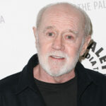 George Carlin's estate settles lawsuit against podcasters' AI comedy special